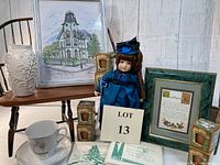 Complete lot shown on wood floor with all items including doll, framed poem, candles, teacup/saucer, note cards, vase, Victorian home picture, and doll bench