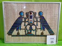 Front view of framed Egyptian papyrus print showing detailed blue bird motifs and central hieroglyphic design.