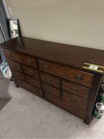 Oblique view of full dresser showing top surface, drawer layout, hardware