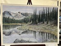 Full view of the pastel painting showing the forest, lake reflection and mountain background.
