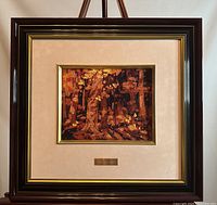 Full front view of framed artwork showing frame, mat, and print
