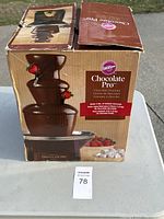 Photo of the original box showing product image and label 'Chocolate Pro'