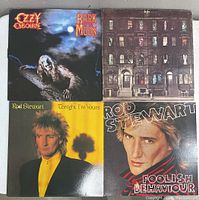 Front covers of four vinyl record albums: Bark at the Moon, Physical Graffiti, Tonight I'm Yours, Foolish Behaviour