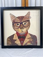 Front view of the framed 3D cat artwork showing the entire piece with the cat wearing glasses, jacket, and bow tie.