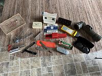 Overview of all vintage items including clipper, razors, blades, ViewMaster, flashlight, and accessories.