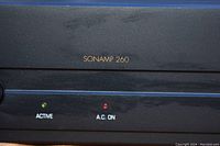 Close-up of front panel with Sonamp 260 branding and two indicator lights labeled Active and A.C ON.