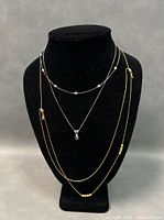 Set of 3 sterling silver necklaces displayed on black bust, showing overall look and length differences.