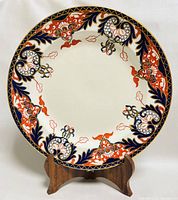 Front view showing full decorative pattern of the antique Royal Crown Derby 10-inch plate.