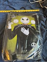 Front view of the Jack Skellington costume accessory kit package with character image and product title visible.