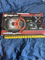 Box showing Snap-on limited edition Alias drone branding and features.
