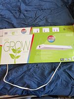 Photo of the Innova LED indoor grow light box showing product branding and red/blue LED specification.