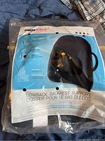 Front packaging view of new Obus Forme black lowback backrest support, showing product name and usage.