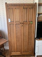 Front view of wardrobe showing full elevation and paneled double doors