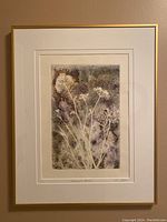 Framed monoprint hanging on wall showing overall artwork, mat, and frame.