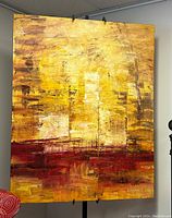 Full view of the original acrylic abstract painting with dominant yellow, gold and red tones.