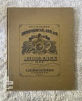 Front cover of the atlas titled Illustrated Historical Atlas County of Middlesex. Printed by H.R. Page & Co, Toronto, 1878. The cover is tan with printed graphics and text.