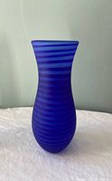 Front view of the cobalt blue spiral swirl vase showing the full profile and pattern.
