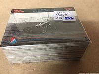 Stack of 1992 Formula 1 collector cards in high grade condition with label showing count and near set status