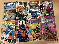 Photo of 9 comic books featuring Marvel and DC superheroes, arranged in a 3x3 grid. Includes multiple Green Lantern issues, Captain America, Spider-Man, Hulk, and Guardians of the Galaxy.
