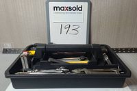 Tool tray showing overall contents and handle side