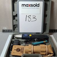 Tools displayed in an open gray plastic toolbox with a Maxsold number card.