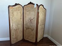 Front view of three-panel folding screen showing full design and scale