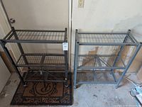 Pair of Origami brand metal folding rolling shelves, side by side, showing size and general condition.