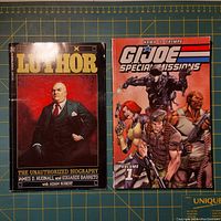 Front covers of Luthor and GI Joe Special Missions Volume 1 comic books showing titles and cover artwork.