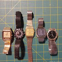Photo showing all five quartz wristwatches aligned horizontally