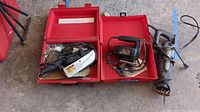 Ward sander/polisher, Black & Decker jig saw, Craftsman reciprocating saw in red carrying cases