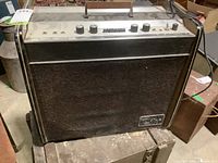 Front view of Viking amplifier showing black textured grille and logo plate.