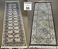 Two runner rugs side by side showing whole length and borders, one with light grey base and cream border, the other cream base with a black border.