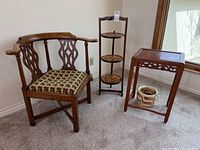 Corner chair, plant stand, side table and basket grouped