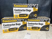 Photo showing three sealed boxes of Commander Contractor Bags, 42 gallons, 20 bags per box.