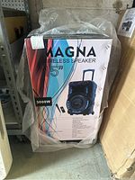 The sealed new Magna wireless speaker box wrapped in plastic