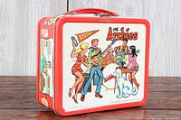 Front and side view of the metal lunch box showing The Archies cartoon band and characters.