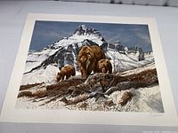 Full view of the 28x22 inch print showing three brown bears in snow with large mountain in background