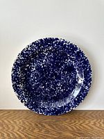 Top view showing the large round platter with blue speckled pattern