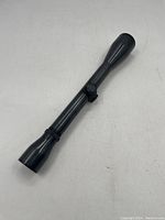 Full angled view of black Weaver Classic K6 rifle scope showing general shape and design.