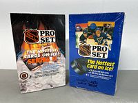 Two sealed boxes of NHL Pro Set hockey cards, Series 1 and Series 2, standing side by side showing front-facing box designs.