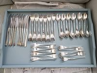 Tray of 48 pieces: 12 knives, 12 forks, 12 spoons, 12 additional small forks