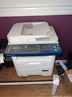 Full front and top view of the Xerox WorkCentre 3315 showing control panel, document feeder, and paper tray.