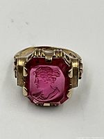 Front view showing carved intaglio amethyst and gold setting