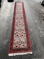 Full-length overhead view of entire runner on pavement