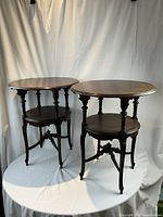 Pair of tables shown side by side against white backdrop