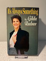 Front cover of the first edition 1989 book 'It's Always Something' by Gilda Radner; shows dust jacket with photo of Gilda Radner.