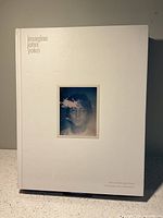 Front cover of the book showing a white background, text 'imagine john yoko', and a small photo of John Lennon.