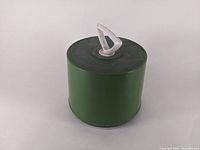 Green Disk-Go case with white handle on top