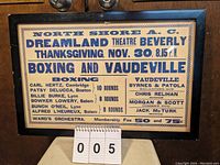 Full view of framed poster advertising boxing and vaudeville at Dreamland Theatre, featuring event date Thanksgiving Nov. 30, 8:15 P.M.