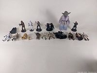 Full group layout of all 16 Star Wars action figures showing various characters with different poses and accessories
